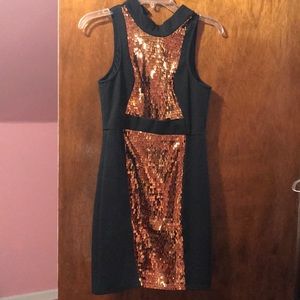 Black and gold sequined dress